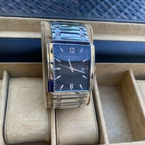 Kenneth Cole stainless steel watch.